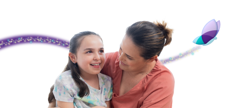 Clare, age 9, living with Rett syndrome, with her mom