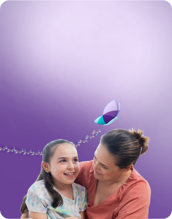 Clare, age 9, living with Rett syndrome, with her mom