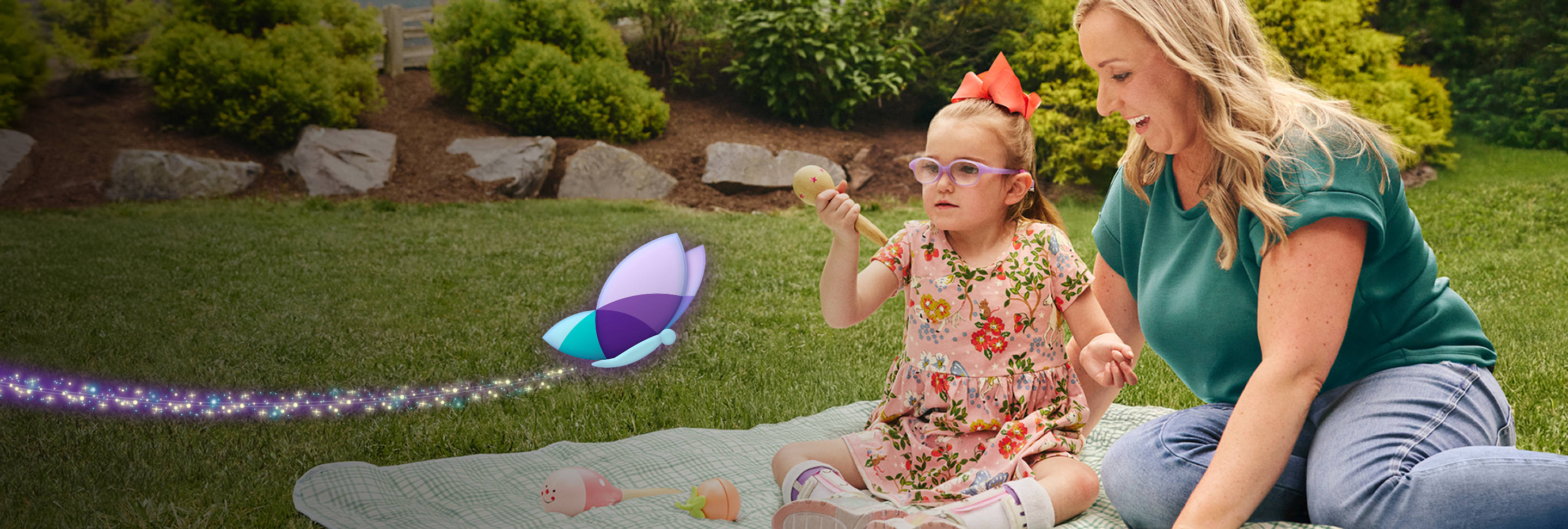 Madelyn, age 5, living with Rett syndrome, with her mom. Graphic butterfly moves toward Madelyn.